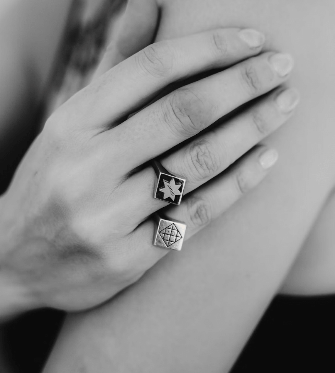 Close-up of hands with jewelry